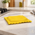 Repose-cuillère ravioli en silicone Cuizy Rest près de la cuisinière